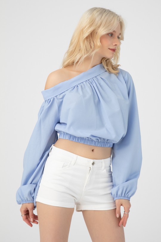 Blaue Bluse mit überschnittenen Schultern und elastischem Bund 