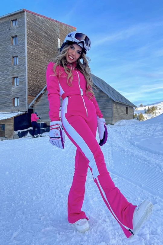 Black ski jumpsuit with side stripes and flared Spanish-style legs - 6