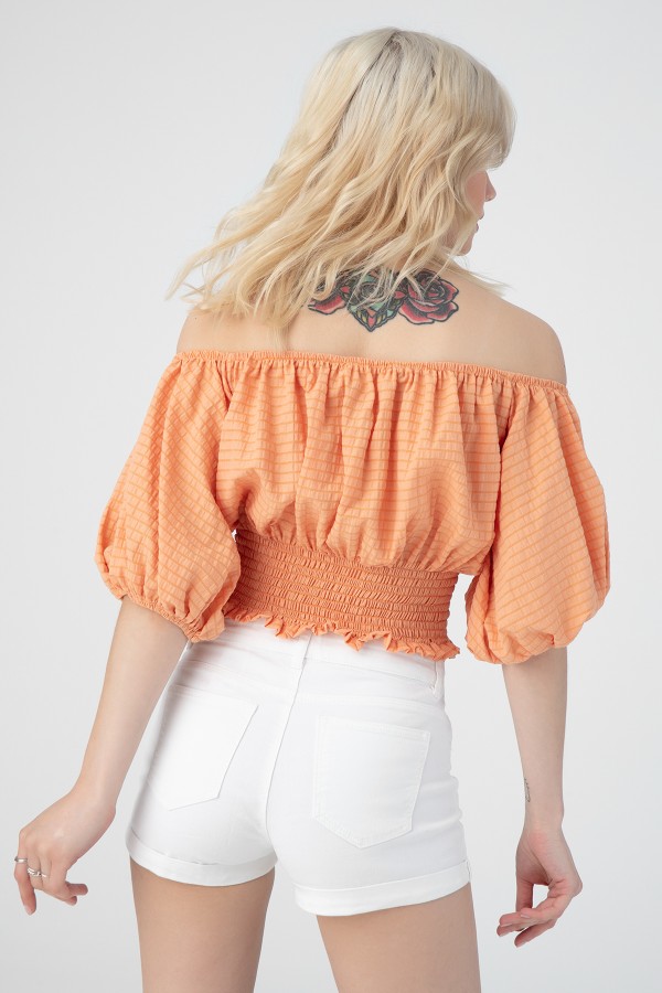 Orangenfarbene Bluse mit überschnittenen Schultern und elastischem Bund - 3