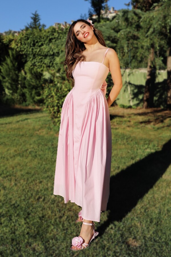 Pink midi dress with open back and bow detail - 1