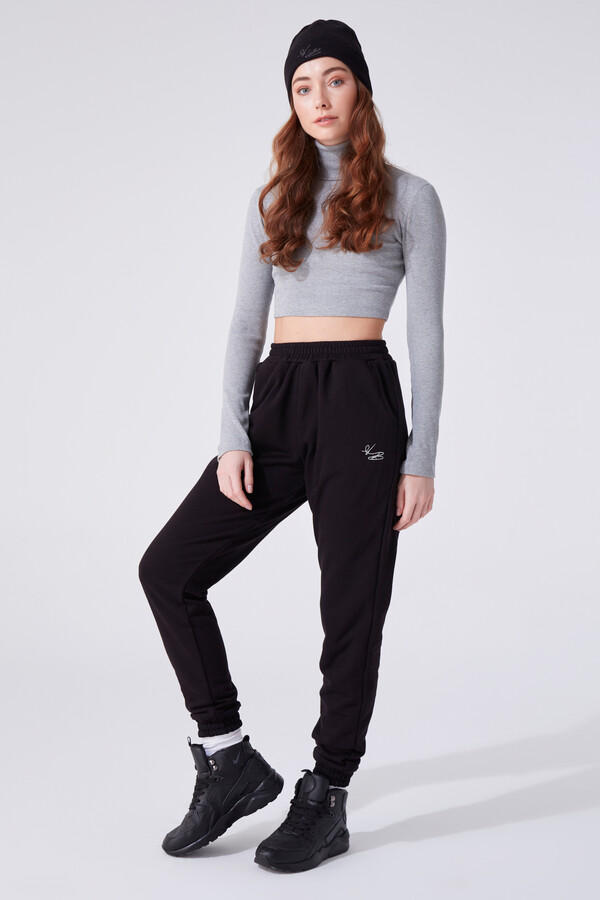 Schwarze Jogginghose mit elastischen Bündchen und hohem Bund - 1