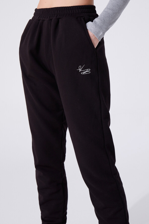 Schwarze Jogginghose mit elastischen Bündchen und hohem Bund - 2