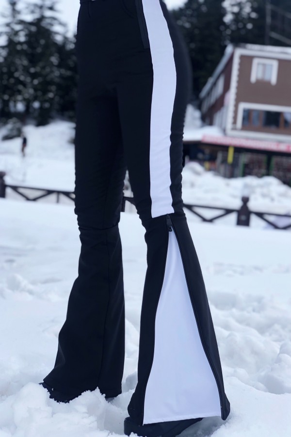 Schwarzer Softshell-Skioverall mit ausgestelltem Bein und seitlichen Streifen - 4