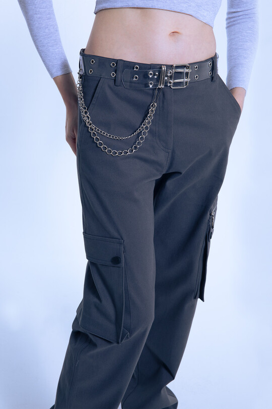 Transparent grommet leather belt with chain detail 